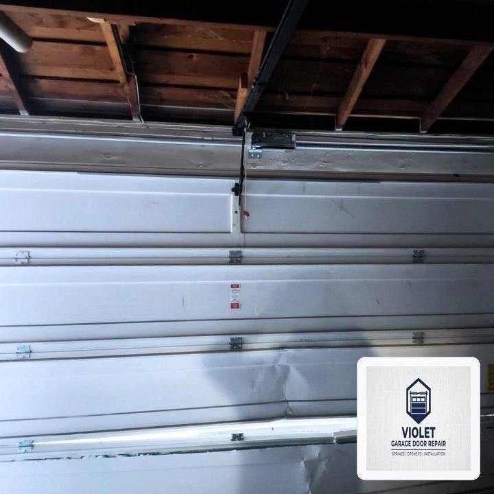 Violet Garage Door Repair in Quincy, MA: Heavy-Duty Steel Section Strut & 11-Gauge Hinge Reinforcement - Quincy, MA